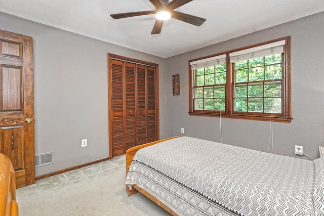 55 Gate Way, Hamden, CT 06518 - bedroom with light carpet, a closet, and ceiling fan