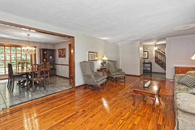 55 Gate Way, Hamden, CT 06518 - living area with stairs, wood finished floors, and a chandelier