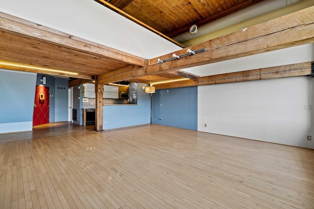 68 Thermos Ave Unit 302D, Norwich, CT 06360 - unfurnished living room featuring a wood ceiling with exposed beams and hardwood / wood-style floors
