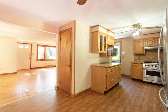 26 Hunt Ln, East Haven, CT 06512 - kitchen featuring a ceiling fan, high end stainless steel range, dark wood-type flooring, tasteful backsplash, and glass insert cabinets