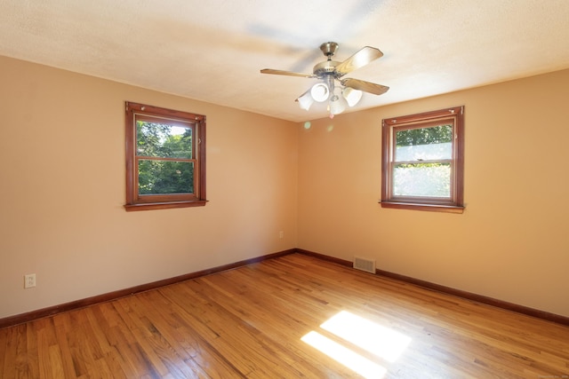26 Hunt Ln, East Haven, CT 06512 - unfurnished room with light wood finished floors and a ceiling fan
