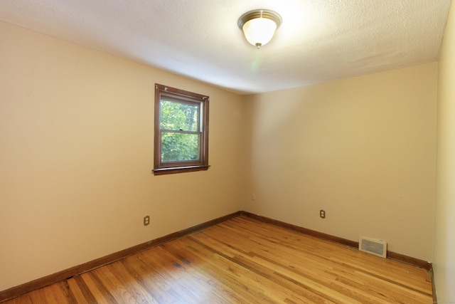 26 Hunt Ln, East Haven, CT 06512 - empty room featuring light wood-style flooring and baseboards