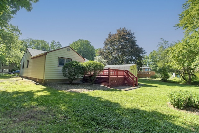 26 Hunt Ln, East Haven, CT 06512 - view of grassy yard featuring a wooden deck