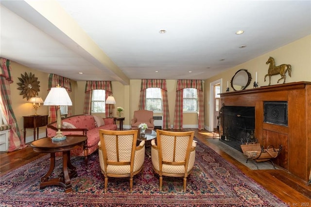 300 Ridgefield Rd, Wilton, CT 06897 - living area with wood finished floors, plenty of natural light, a fireplace with flush hearth, and recessed lighting