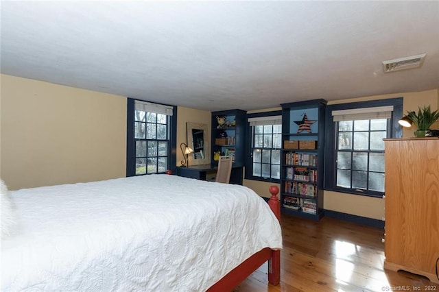 300 Ridgefield Rd, Wilton, CT 06897 - bedroom featuring wood finished floors and multiple windows
