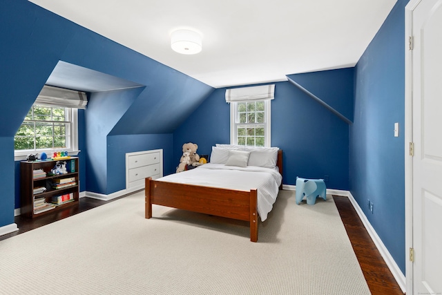 28 Great Hill Rd, Darien, CT 06820 - bedroom with multiple windows, wood finished floors, and vaulted ceiling