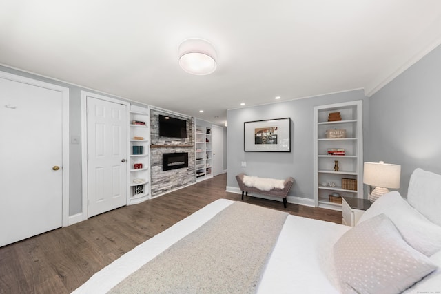 28 Great Hill Rd, Darien, CT 06820 - living room featuring built in features, wood finished floors, and a large fireplace