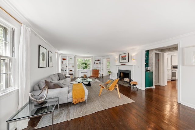 28 Great Hill Rd, Darien, CT 06820 - living room featuring built in features, crown molding, wood finished floors, and a brick fireplace