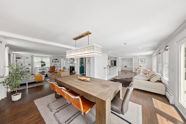 28 Great Hill Rd, Darien, CT 06820 - dining room featuring a fireplace, a baseboard radiator, dark wood finished floors, and recessed lighting