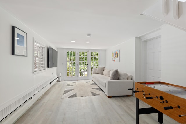 28 Great Hill Rd, Darien, CT 06820 - living area featuring a baseboard heating unit, light wood-style flooring, french doors, and recessed lighting