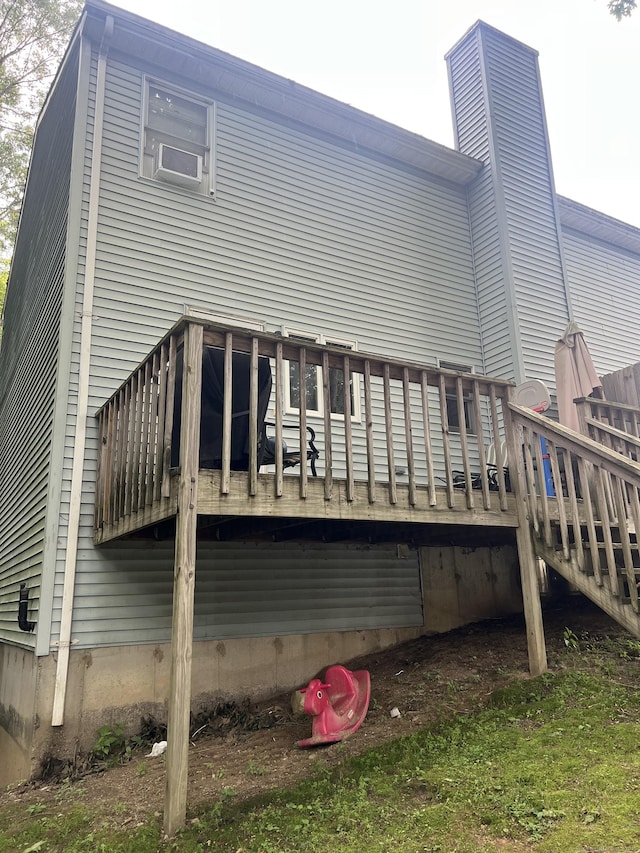 58 Milne Ave, Shelton, CT 06484 - back of property featuring a deck and a chimney