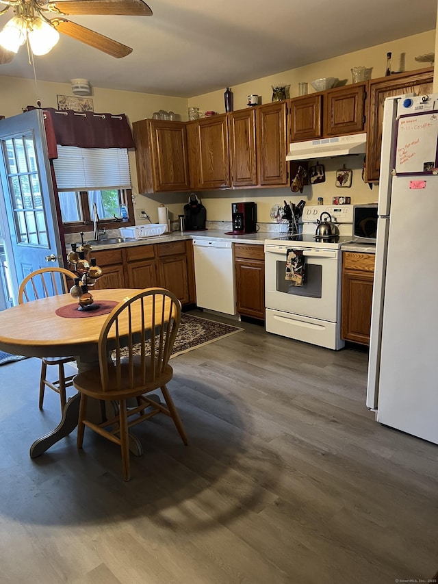 58 Milne Ave, Shelton, CT 06484 - kitchen with white appliances, under cabinet range hood, a ceiling fan, light countertops, and dark wood-type flooring