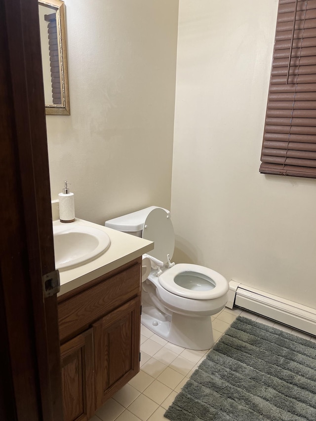 58 Milne Ave, Shelton, CT 06484 - bathroom featuring tile patterned flooring, vanity, and a baseboard heating unit