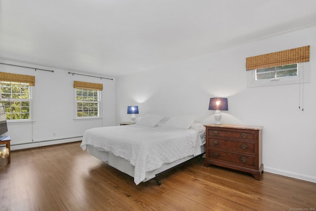 63 Pipers Hill Rd, Wilton, CT 06897 - bedroom with a baseboard radiator and wood finished floors