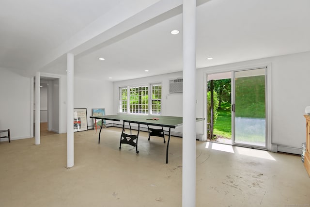 63 Pipers Hill Rd, Wilton, CT 06897 - recreation room featuring concrete floors, a wall mounted air conditioner, and recessed lighting