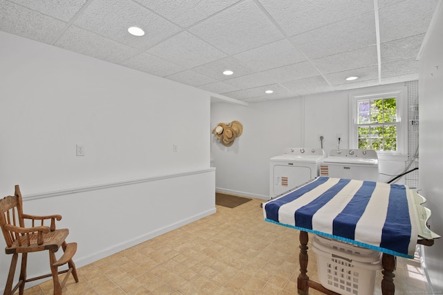 63 Pipers Hill Rd, Wilton, CT 06897 - bedroom with independent washer and dryer, recessed lighting, a drop ceiling, and light floors