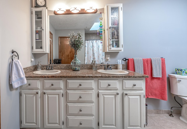 80 Richard Ave, Wolcott, CT 06716 - bathroom featuring double vanity and tile patterned floors