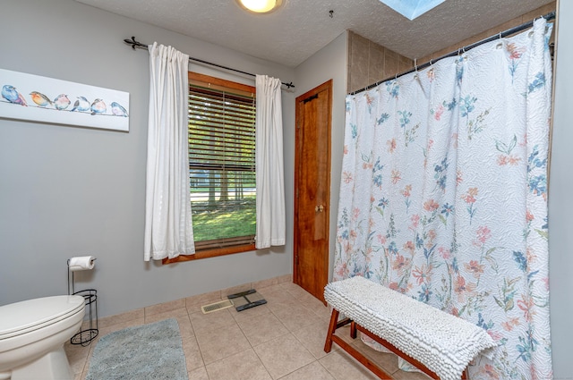 80 Richard Ave, Wolcott, CT 06716 - bathroom with tile patterned floors, a textured ceiling, and a shower with shower curtain