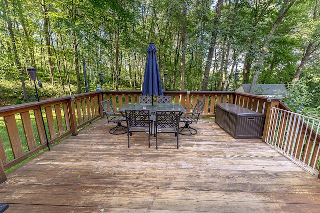 80 Richard Ave, Wolcott, CT 06716 - wooden terrace featuring outdoor dining space and view of scattered trees