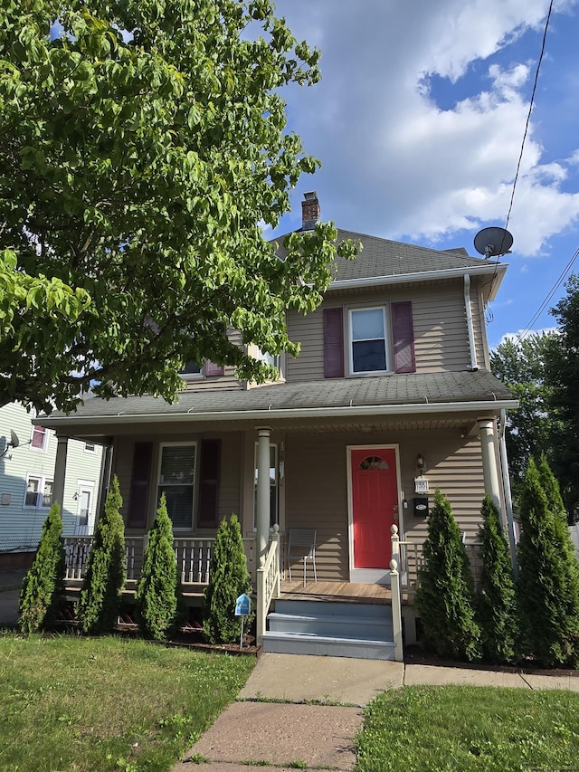 38 Florence St, Manchester, CT 06040 - view of front of home featuring a porch and a chimney