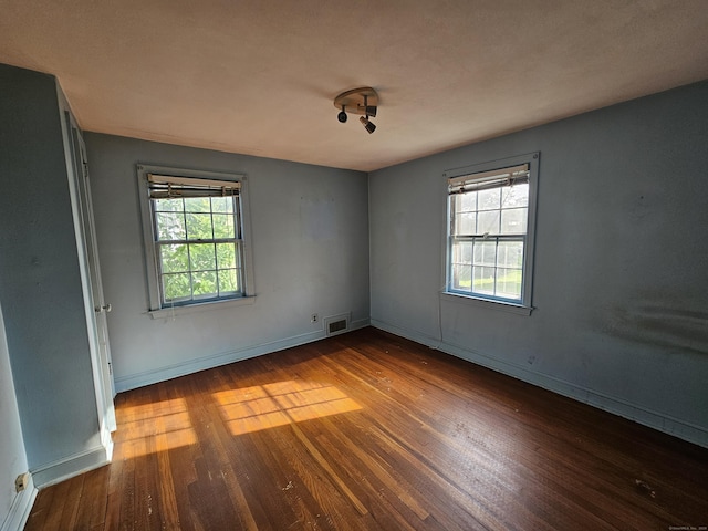 120 Nilan St, Hartford, CT 06106 - unfurnished room featuring wood finished floors and baseboards