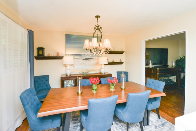 157 Windy Dr, Wolcott, CT 06705 - dining space with a chandelier and wood finished floors