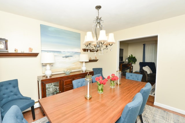 157 Windy Dr, Wolcott, CT 06705 - dining space featuring a chandelier and wood finished floors