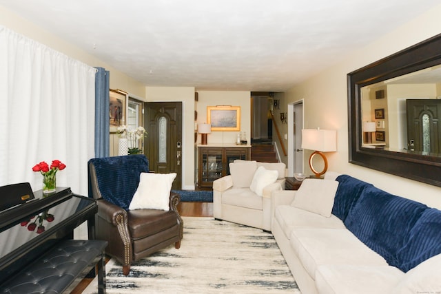 157 Windy Dr, Wolcott, CT 06705 - living room with wood finished floors and stairway