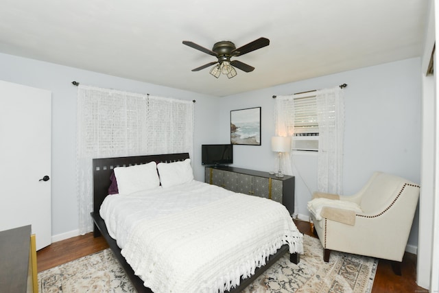 157 Windy Dr, Wolcott, CT 06705 - bedroom with wood finished floors, cooling unit, and ceiling fan
