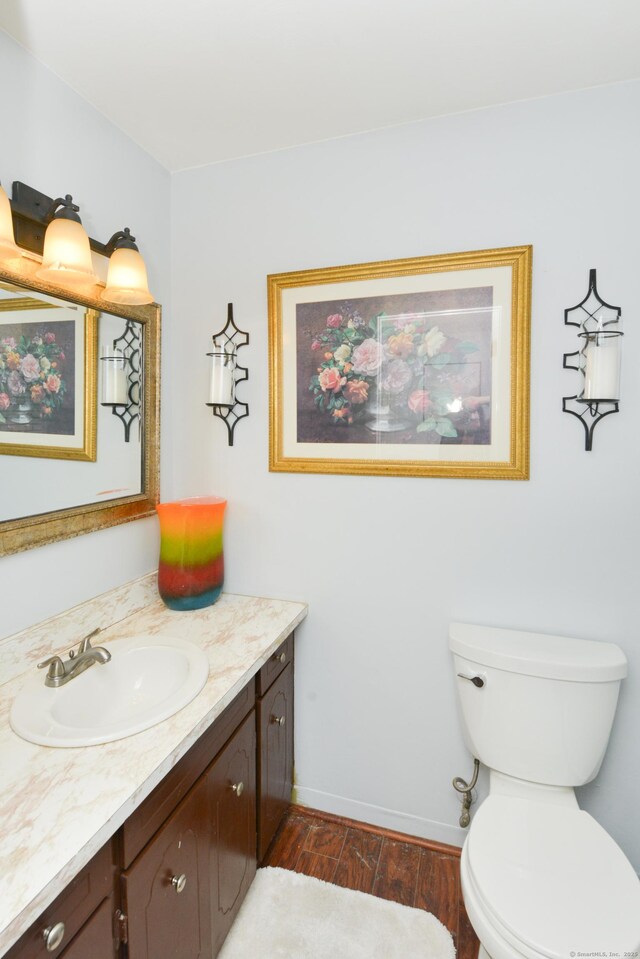 157 Windy Dr, Wolcott, CT 06705 - bathroom featuring vanity and wood finished floors