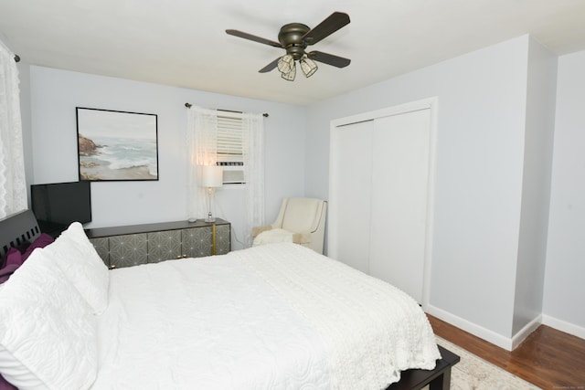 157 Windy Dr, Wolcott, CT 06705 - bedroom with wood finished floors, a closet, a ceiling fan, and cooling unit
