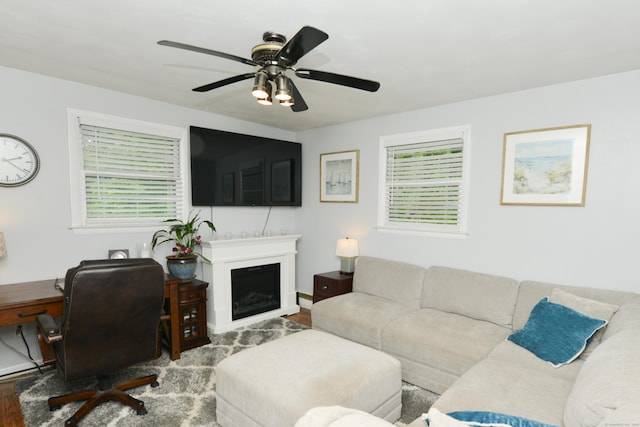 157 Windy Dr, Wolcott, CT 06705 - living area featuring plenty of natural light, wood finished floors, ceiling fan, and a fireplace