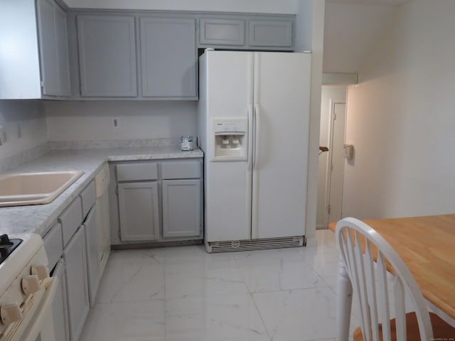 19 Cardston Cir, Windsor, CT 06095 - kitchen featuring white appliances, gray cabinetry, light marble finish floors, and light countertops