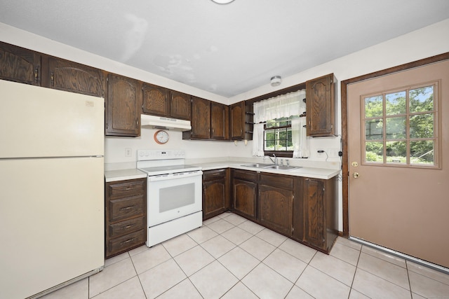 95 Hickory Rd, Naugatuck, CT 06770 - kitchen with white appliances, under cabinet range hood, light countertops, and dark brown cabinetry