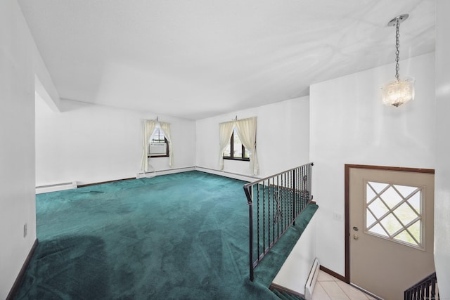95 Hickory Rd, Naugatuck, CT 06770 - unfurnished living room with a baseboard radiator, healthy amount of natural light, carpet floors, and cooling unit