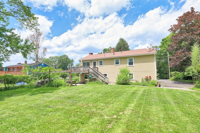 95 Hickory Rd, Naugatuck, CT 06770 - view of yard with stairway and a wooden deck