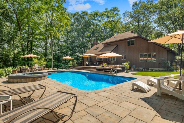 19 Pumpkin Hill Rd, Trumbull, CT 06611 - view of pool with an outdoor living space, a patio, and a pool with connected hot tub