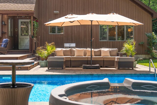 19 Pumpkin Hill Rd, Trumbull, CT 06611 - outdoor pool featuring outdoor lounge area, a hot tub, and a patio area