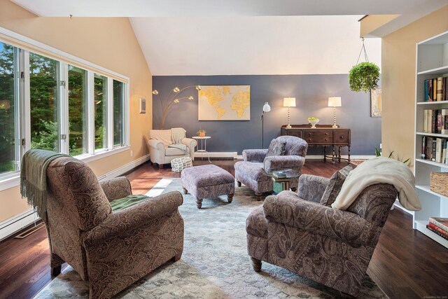 19 Pumpkin Hill Rd, Trumbull, CT 06611 - living room with vaulted ceiling, wood finished floors, baseboard heating, and a baseboard heating unit