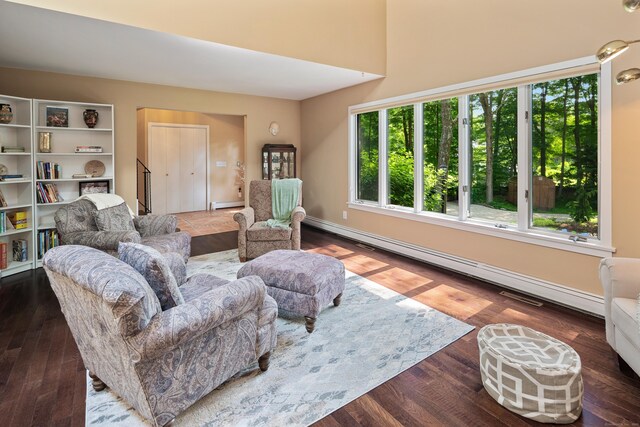 19 Pumpkin Hill Rd, Trumbull, CT 06611 - living room with wood finished floors and a baseboard heating unit