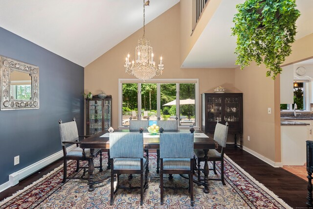 19 Pumpkin Hill Rd, Trumbull, CT 06611 - dining space featuring wood finished floors, high vaulted ceiling, and a chandelier