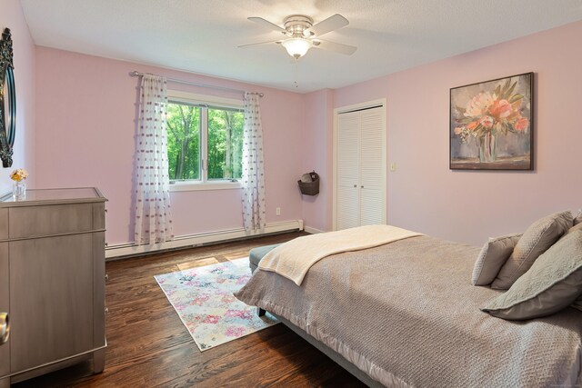 19 Pumpkin Hill Rd, Trumbull, CT 06611 - bedroom featuring a baseboard heating unit, dark wood finished floors, a closet, and ceiling fan