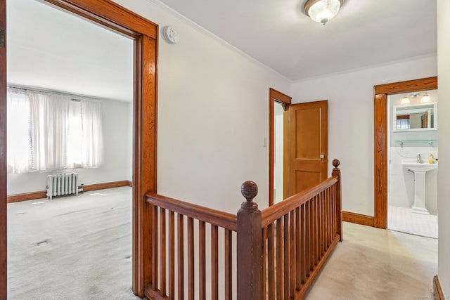12 Lincoln Ave, Danbury, CT 06810 - corridor with radiator, carpet flooring, and an upstairs landing