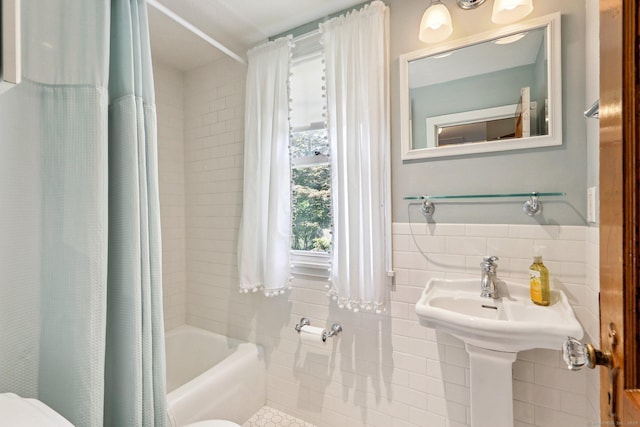 12 Lincoln Ave, Danbury, CT 06810 - full bath featuring tile walls, shower / tub combo with curtain, tile patterned floors, and wainscoting
