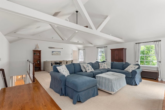 92 Hornbeam Rd, Fairfield, CT 06824 - living area featuring beamed ceiling, light wood-style floors, and high vaulted ceiling