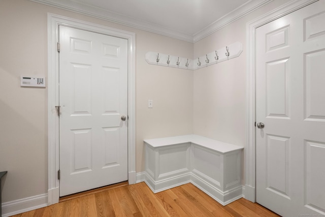 92 Hornbeam Rd, Fairfield, CT 06824 - mudroom with light wood-style floors and crown molding