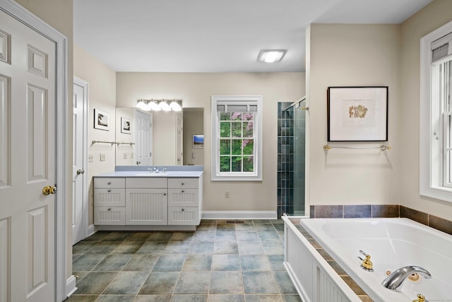 95 Cedar Swamp Rd, Chester, CT 06412 - bathroom with vanity, a whirlpool tub, a stall shower, and stone finish floors