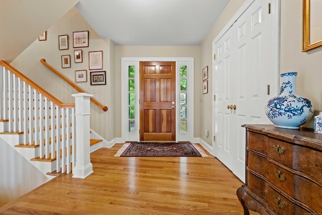 95 Cedar Swamp Rd, Chester, CT 06412 - foyer featuring wood finished floors and stairs