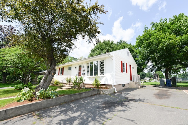 129 Tomlinson Ave, Plainville, CT 06062 - single story home featuring asphalt driveway