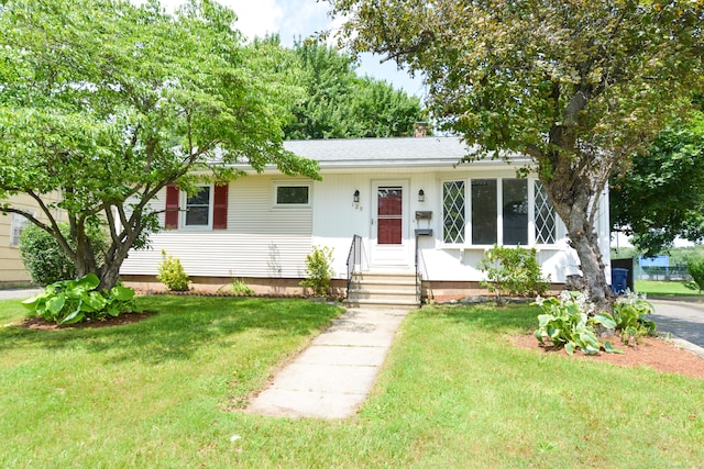 129 Tomlinson Ave, Plainville, CT 06062 - ranch-style home with a front lawn